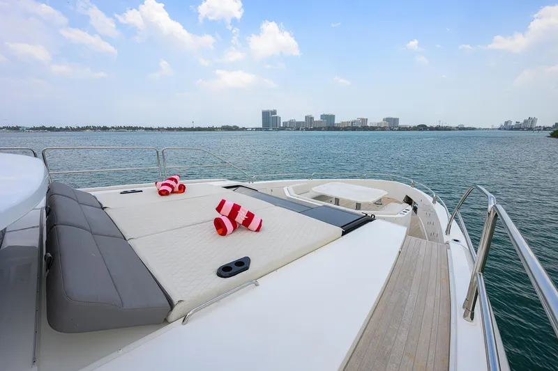  Yacht Photos Pics 2024 Sirena 88 yacht deck with sun loungers and ocean view.