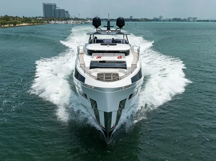  Yacht Photos Pics 2024 Sirena 88 yacht cruising on open water, showcasing luxury and sleek design.