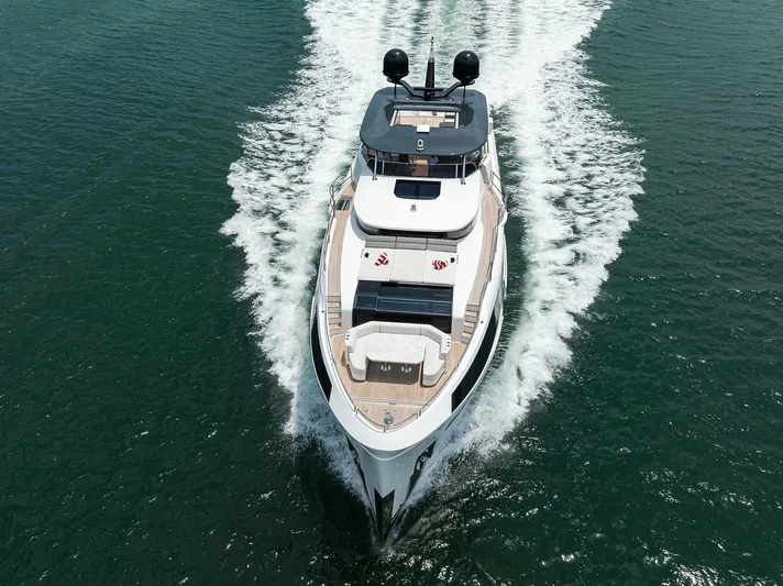  Yacht Photos Pics Luxury 2024 Sirena 88 yacht cruising on open water, aerial view.