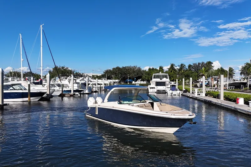  Yacht Photos Pics 2026 Chris-Craft Launch 35 GT boat docked in a sunny marina setting.