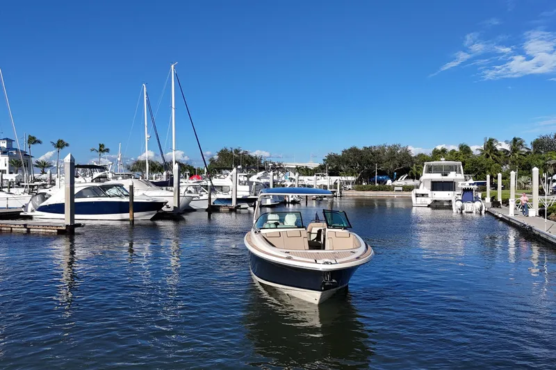  Yacht Photos Pics 2026 Chris-Craft Launch 35 GT in a sunny marina setting.
