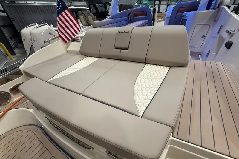  Yacht Photos Pics 2026 Chris-Craft Launch 35 GT boat interior with luxurious seating and American flag.