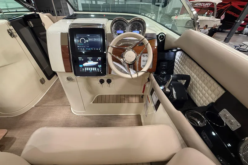  Yacht Photos Pics 2026 Chris-Craft Launch 35 GT cockpit with modern controls and luxurious interior design.
