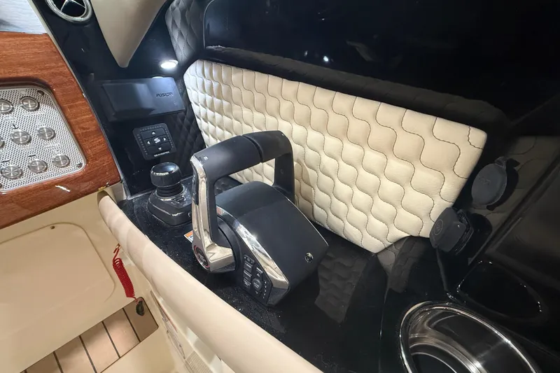  Yacht Photos Pics 2026 Chris-Craft Launch 35 GT helm with luxurious controls and quilted leather accents.