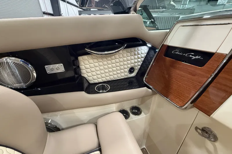  Yacht Photos Pics Luxurious interior of 2026 Chris-Craft Launch 35 GT with elegant wood and leather accents.
