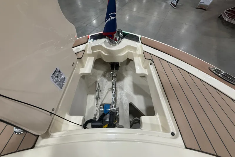  Yacht Photos Pics 2026 Chris-Craft Launch 35 GT anchor compartment with teak decking and chain mechanism.