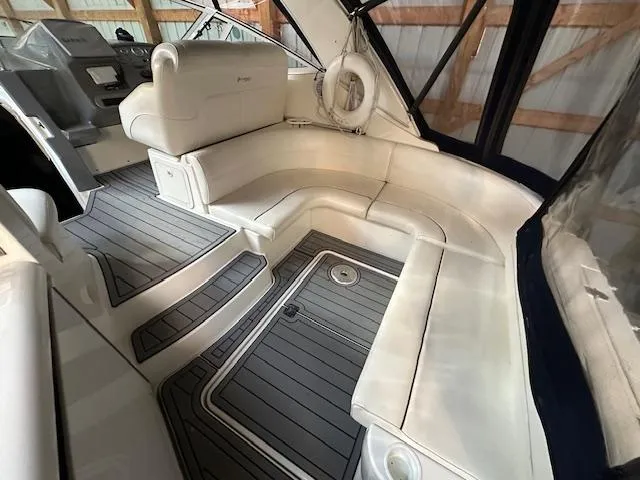  Yacht Photos Pics 2005 Cruisers Yachts 340 Express interior with white seating and gray flooring.
