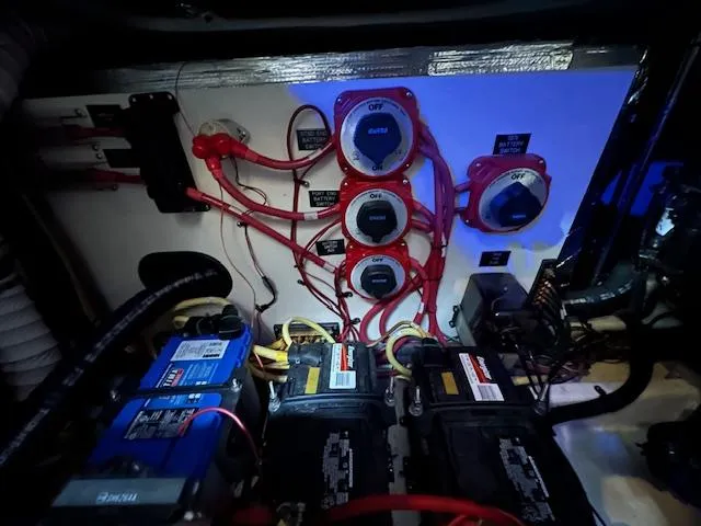  Yacht Photos Pics Electrical system of a 2005 Cruisers Yachts 340 Express, featuring batteries and wiring.