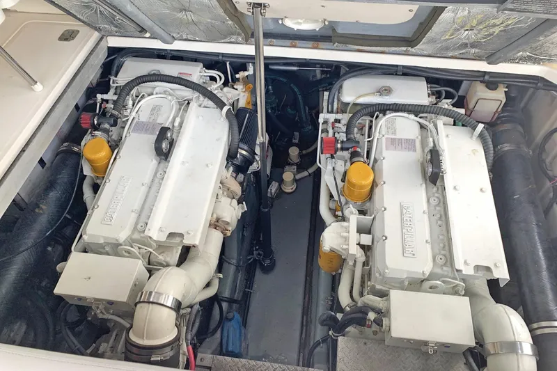 Makai Yacht Photos Pics Engine room of a 2000 Sea Ray 410 Sundancer with twin Caterpillar engines.