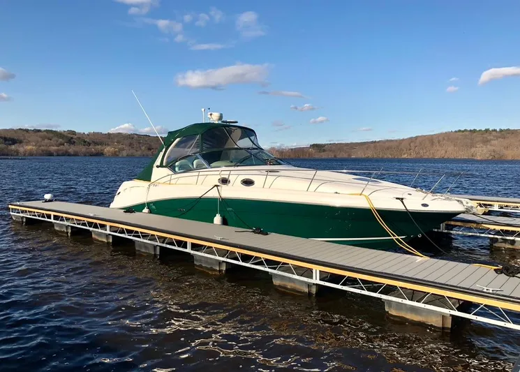 Serenity Yacht Photos Pics 2004 Sea Ray 340 Sundancer docked on a sunny day.