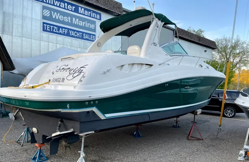 Serenity Yacht Photos Pics 2004 Sea Ray 340 Sundancer yacht on stands at Stillwater Marina.