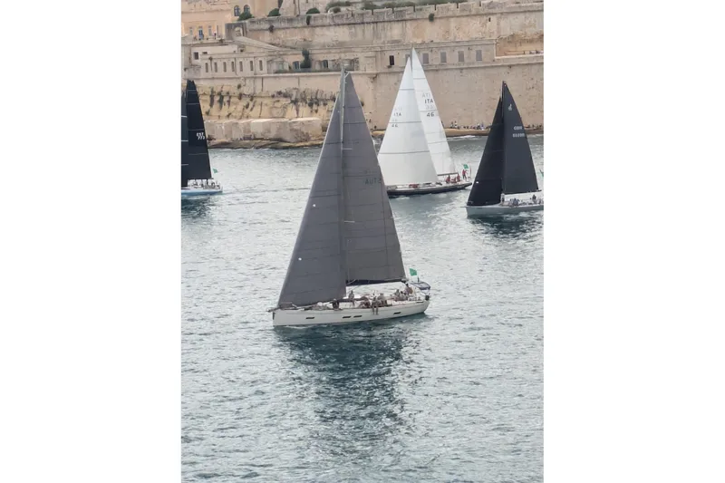 Deiopea Yacht Photos Pics Italia Yachts IY13.98 sailing in a regatta, 2013 model, with multiple yachts nearby.