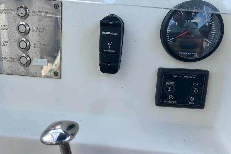 Deiopea Yacht Photos Pics Italia Yachts IY13.98 2013 dashboard with controls, RPM gauge, and waterproof USB charger.