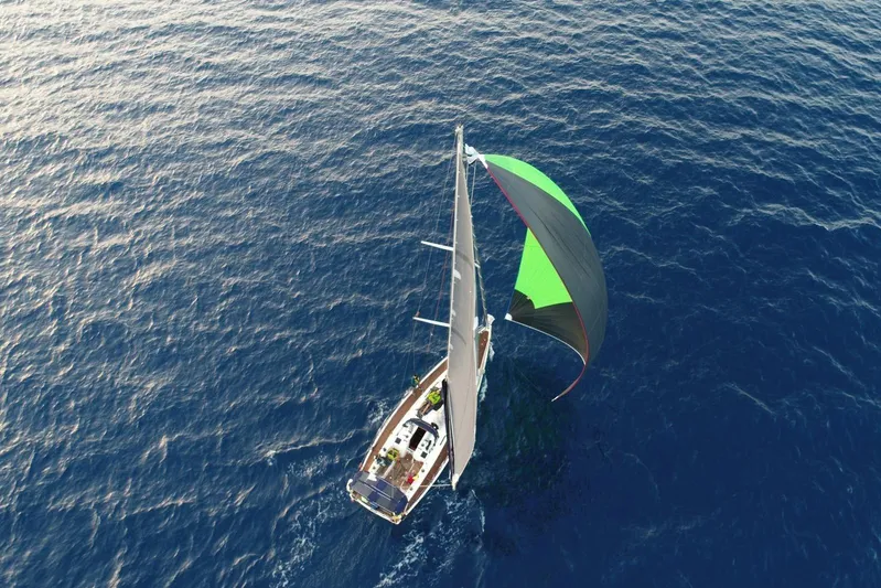 Deiopea Yacht Photos Pics Aerial view of 2013 Italia Yachts IY13.98 sailing on open blue sea.