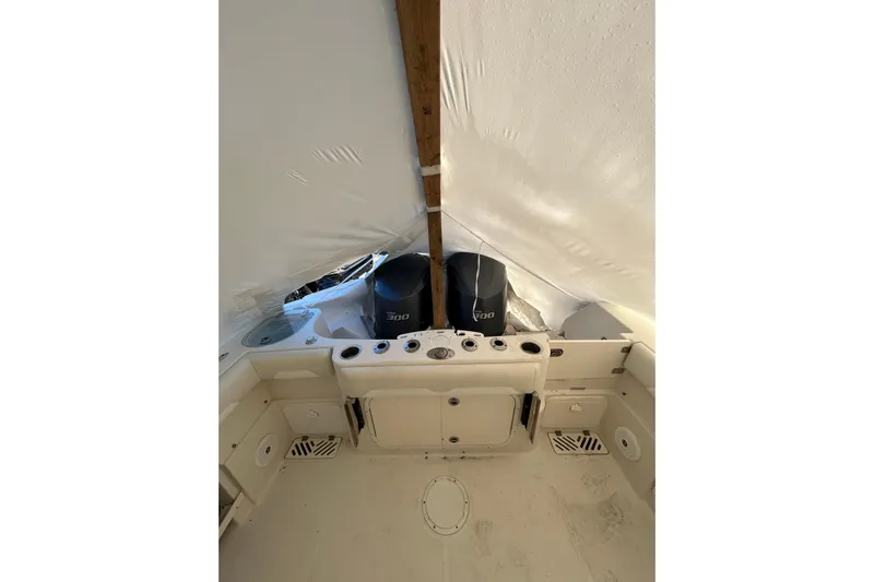  Yacht Photos Pics 2015 Sailfish 290 CC boat interior with dual 300 horsepower engines.