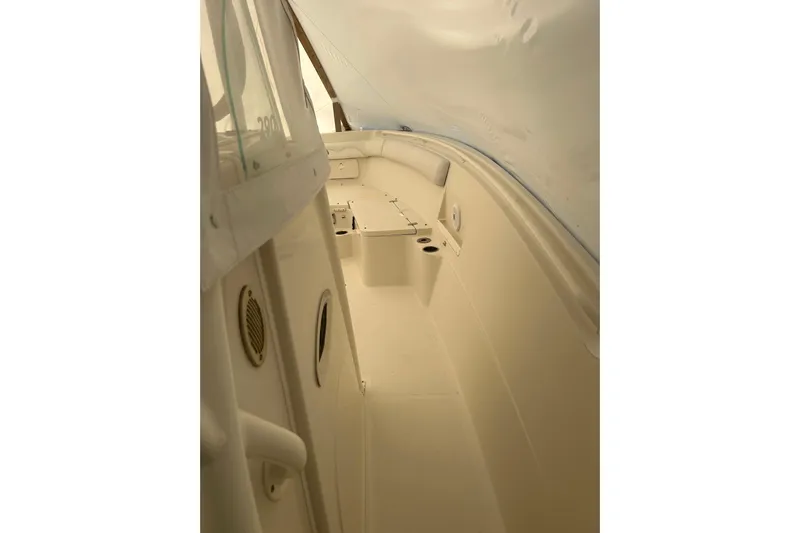  Yacht Photos Pics 2015 Sailfish 290 CC boat interior, featuring spacious seating and sleek design.