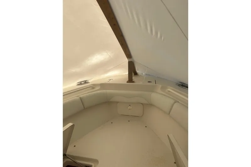 Yacht Photos Pics Interior view of 2015 Sailfish 290 CC boat under cover.