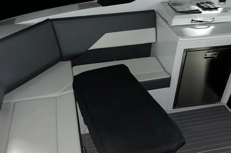  Yacht Photos Pics 2023 Cruisers Yachts 38 GLS interior with sleek seating and modern cabinetry.