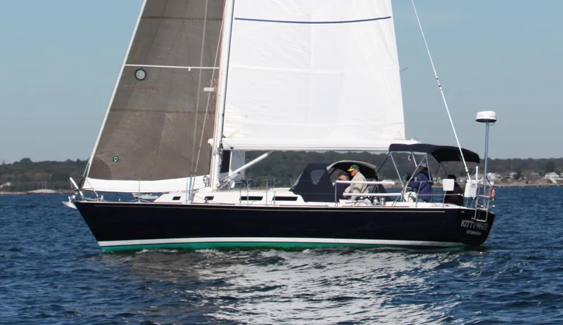 Kittywake Yacht Photos Pics Sailing yacht J Boats J/42, 1996 model, cruising on open water.