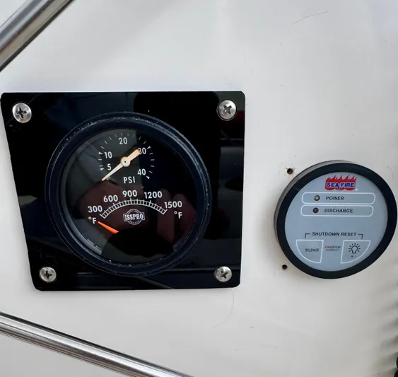 Pandemonium Yacht Photos Pics Gauge and control panel on 2000 Liberty 42 Express boat dashboard.