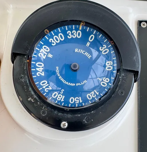 Pandemonium Yacht Photos Pics Compass on Liberty 42 Express boat, 2000 model, showing cardinal directions.