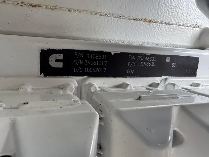 Pandemonium Yacht Photos Pics Label on engine with serial and part numbers, Liberty 42 Express, 2000 model.