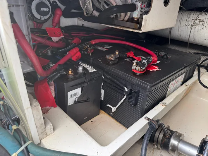 Pandemonium Yacht Photos Pics Battery compartment of a 2000 Liberty 42 Express boat with cables and connections.