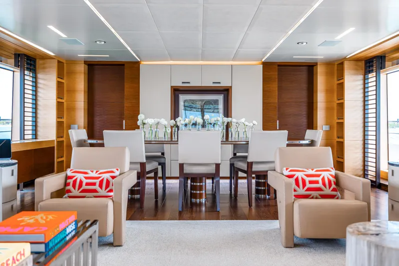 Patience Yacht Photos Pics Luxurious interior of 2012 Benetti Classic Supreme 132 yacht with elegant dining area.