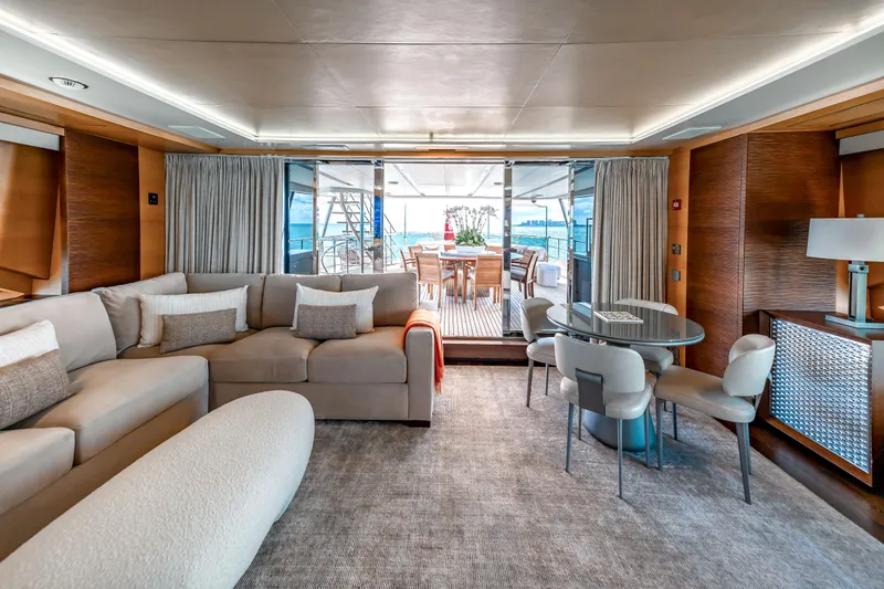 Patience Yacht Photos Pics Luxurious interior of 2012 Benetti Classic Supreme 132 yacht with elegant seating and dining area.