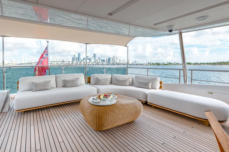 Patience Yacht Photos Pics Luxurious deck of 2012 Benetti Classic Supreme 132 yacht with city skyline view.