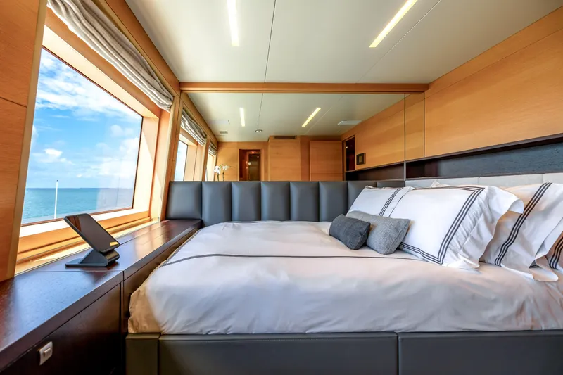 Patience Yacht Photos Pics Luxurious bedroom interior on 2012 Benetti Classic Supreme 132 yacht with ocean view.