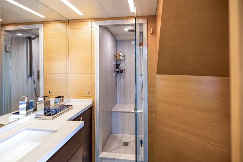 Patience Yacht Photos Pics Luxurious bathroom on 2012 Benetti Classic Supreme 132 yacht with modern shower and sleek design.