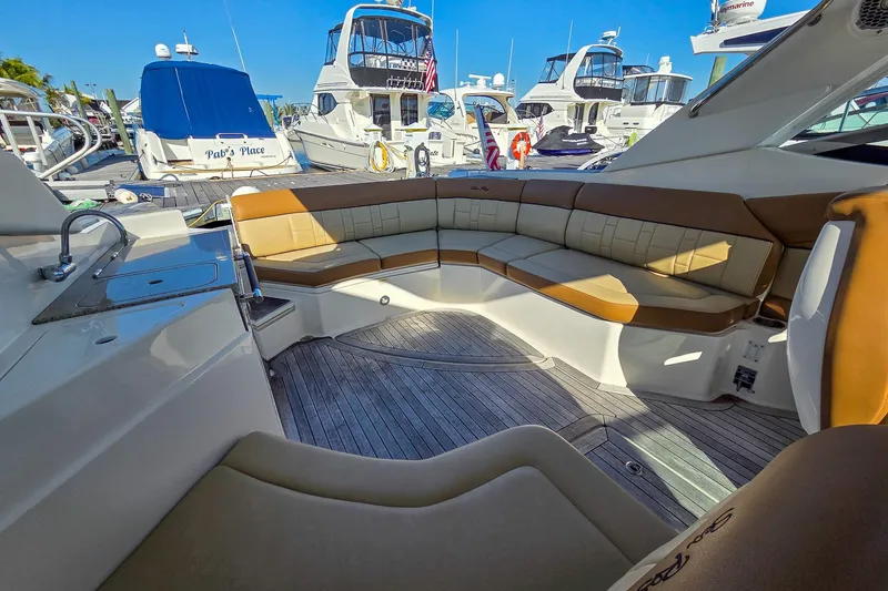  Yacht Photos Pics Luxurious 2015 Sea Ray 350 SLX boat interior with spacious seating at marina.