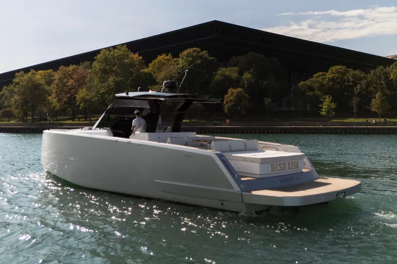  Yacht Photos Pics Luxury Pardo Yachts 2023 model cruising on a serene waterway.