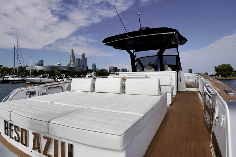  Yacht Photos Pics Luxury Pardo Yachts 2023 model with spacious deck, city skyline in background.