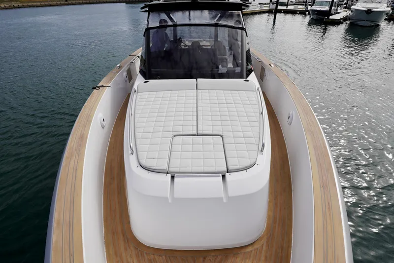  Yacht Photos Pics 2023 Pardo Yachts model with sleek deck design and luxurious seating on calm waters.