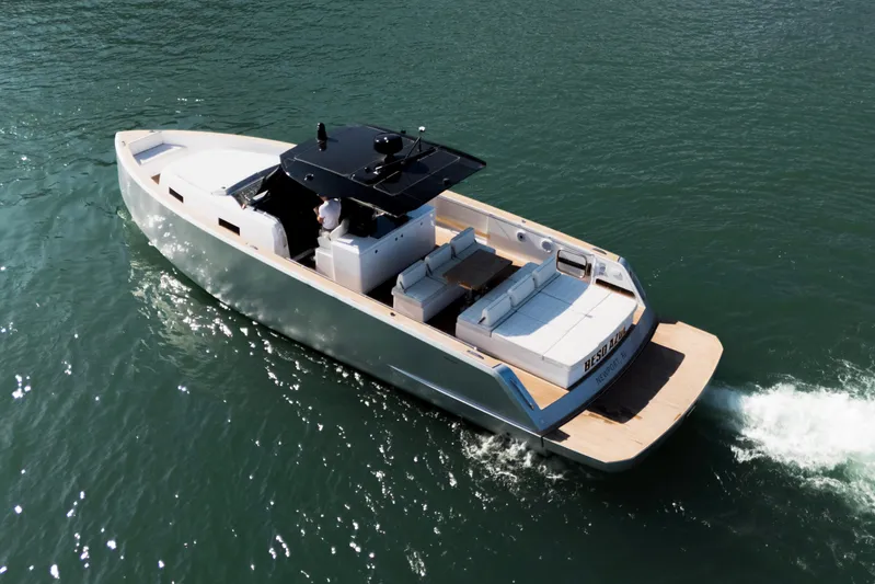  Yacht Photos Pics Luxury 2023 Pardo Yachts model cruising on open water, showcasing sleek design and elegance.