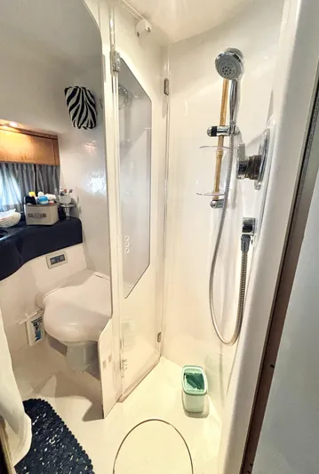  Yacht Photos Pics Bathroom interior of 1994 Princess 45 Flybridge yacht with shower and toilet.