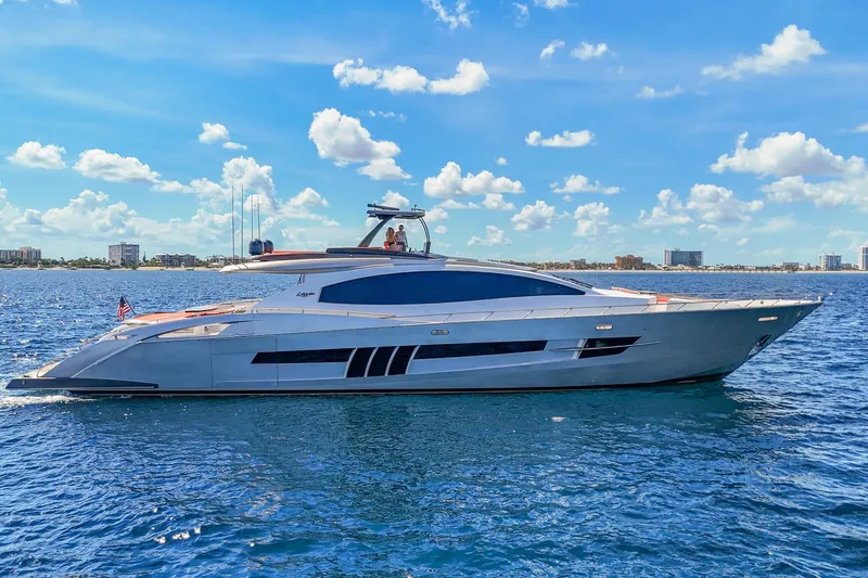  Yacht Photos Pics Luxury 2010 Lazzara LSX 92 yacht cruising on a sunny day with city skyline.