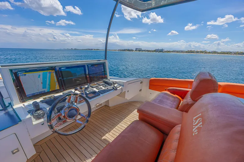  Yacht Photos Pics Luxurious 2010 Lazzara LSX 92 yacht helm with panoramic ocean view.