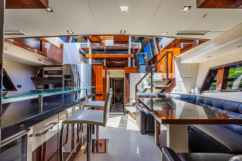  Yacht Photos Pics Luxurious interior of 2010 Lazzara LSX 92 yacht with modern design and elegant furnishings.