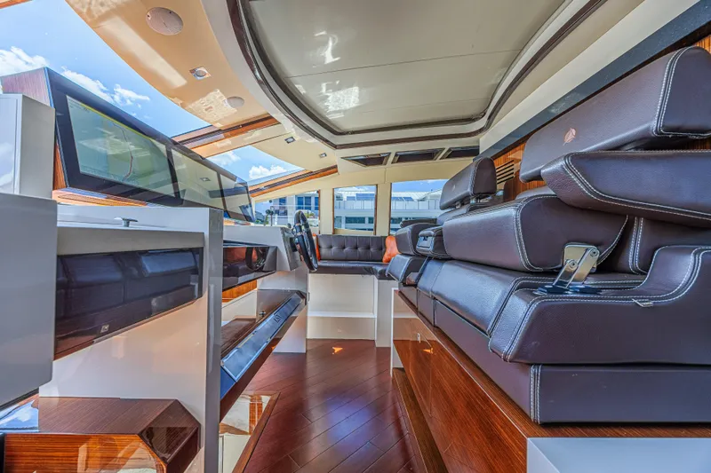  Yacht Photos Pics Luxurious interior of 2010 Lazzara LSX 92 yacht with leather seating and modern design.