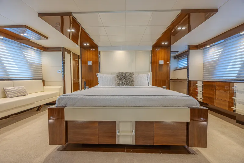  Yacht Photos Pics Luxurious 2010 Lazzara LSX 92 yacht bedroom with modern design and elegant wood finishes.