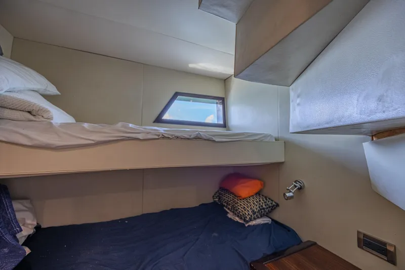  Yacht Photos Pics Cozy cabin interior with bunk beds on 2010 Lazzara LSX 92 yacht.