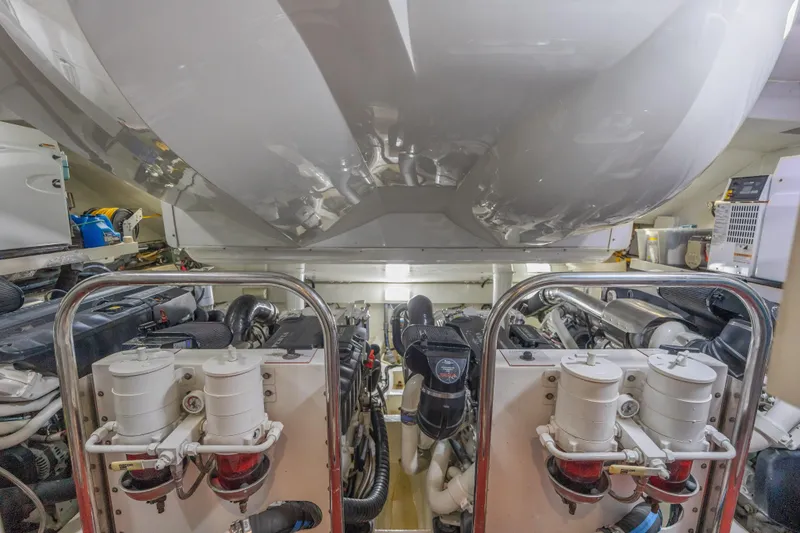  Yacht Photos Pics Engine room of 2010 Lazzara LSX 92 yacht, showcasing dual engines and mechanical components.