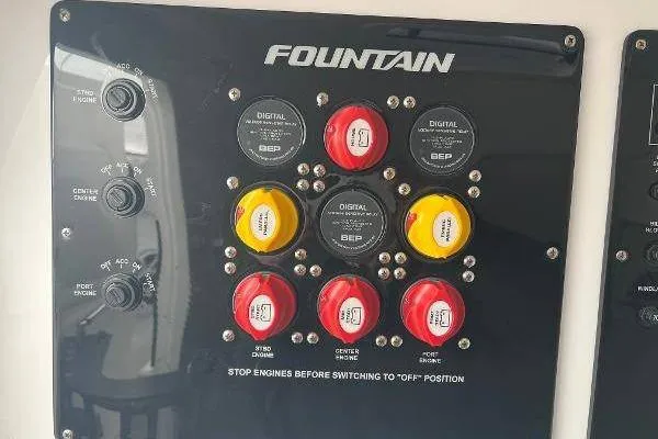  Yacht Photos Pics Control panel of 2025 Fountain 38 SCX boat with labeled switches and buttons.