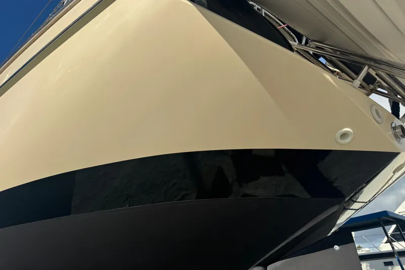 Buena Vida Yacht Photos Pics Close-up of 2000 Island Packet 380 sailboat hull, showcasing sleek design and craftsmanship.