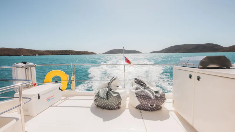 Grace Yacht Photos Pics Aquila 54 Yacht 2022 with ocean view and bean bags on deck.