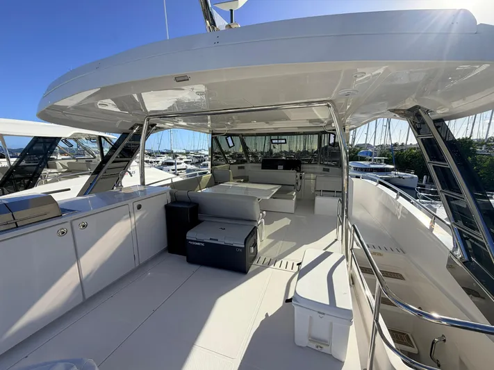 Grace Yacht Photos Pics Luxurious Aquila 54 yacht deck, 2022 model, docked at marina.