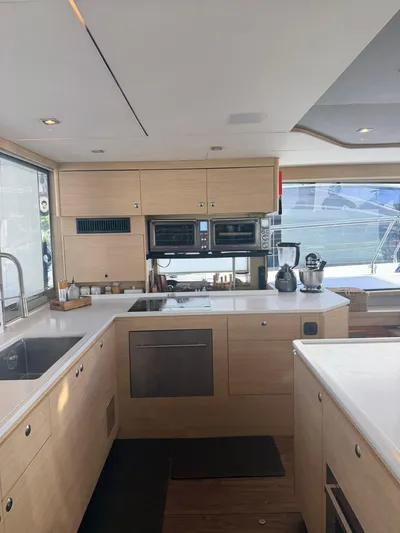 Grace Yacht Photos Pics Modern kitchen on a 2022 Aquila 54 yacht.